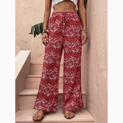 China Anti-Static Elastic Waist Wide Leg Fashion Drawstring Floral Print Casual Long Pants For Women for sale