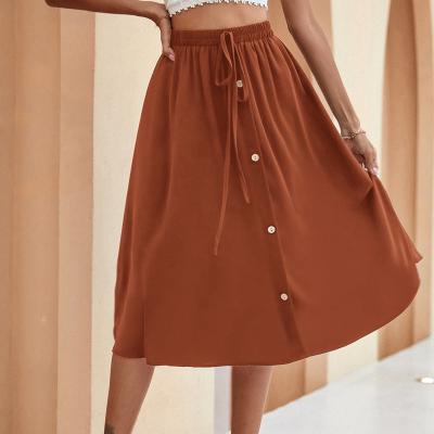 China Anti-Static Ladies Casual Clothing Summer Fashion Solid Mid-Waist Skirt For Women Buttons Skirt With A Belt for sale