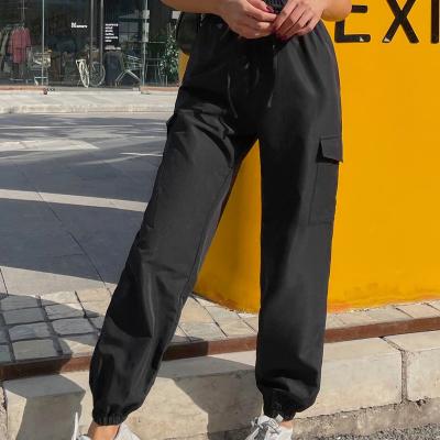 China New Anti-Wrinkle Solid Color Casual Cargo Pants Women Zipper Cargo Tracker Sets for sale