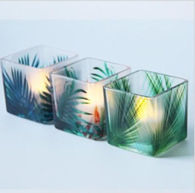 China holiday 6x6x6cm square cup glass candle with rainforest pattern candle holder for sale