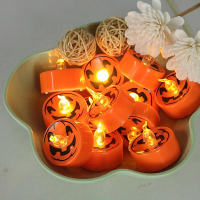 China Other LED Realistic Pumpkin Flickering Tea Lights with Ghost Faces Fall Halloween Thanksgivings Harvest Home Themed Chimney Party Sip for sale