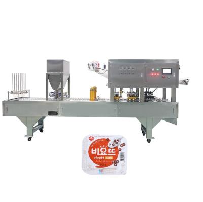 China Automatic Linear Plastic Food 4 Lane Tray Filling Sealing Machine Filler Sealer Equipment For Trays for sale