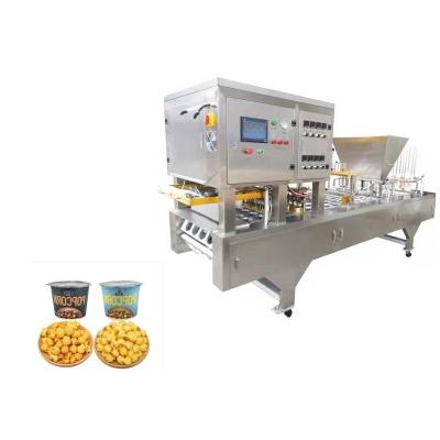 China Linear Automatic Food Popcorn Corn Kernels Pellet Cup Filling And Sealing Machine for sale