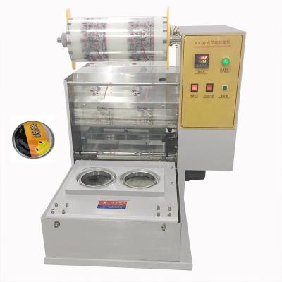 China new design food automatic meal box sealer/plastic bowl sealing machine/lunch tray sealing machine for sale