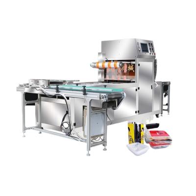 China Continuous Food Tray Sealing Machine Food Tray Sealing Machine for sale