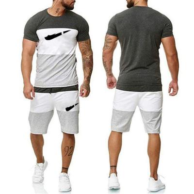 China Anti-wrinkle Summer Men Set Fitness Suit Sports Suits Short Sleeve T-Shirt + Quick Dry Shorts 2 Piece Set for sale