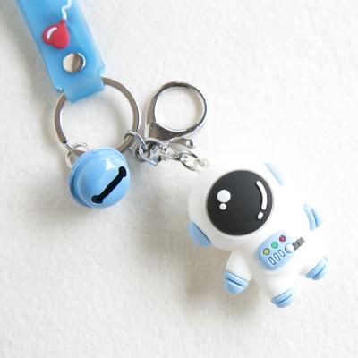 China Rubber In Goods Custom 3D Astronaut Plastic 3d Running Rubber Key Chain With Rubber Wrist Strap for sale