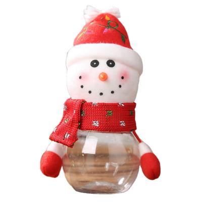 China Santa Cute Child Kids Plush Plastic PVC Candy Jar Christmas Festival Decoration Gifts Custom Storage Bottle for sale