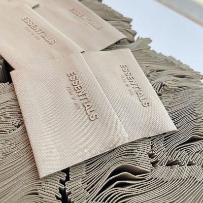 China New Product Sustainable Custom Printed Labels Gray Silicone 3D Clothing Labels Neck Label Clothes Accessories for sale