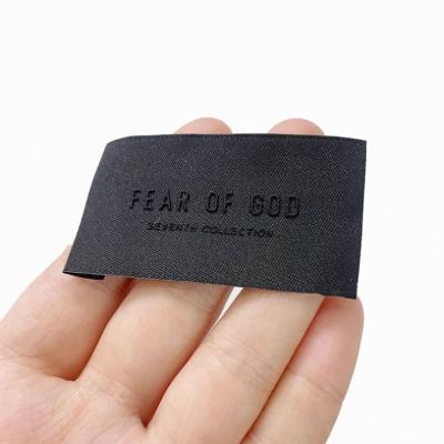 China Sustainable New Design 3D Woven Neck Label Silicone Black Label Custom Brand Apparel Labels for sale