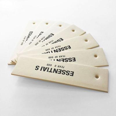 China Viable popular beige paper tag 2022 fashionable brand name clothing thick tags custom tags with your logo for sale