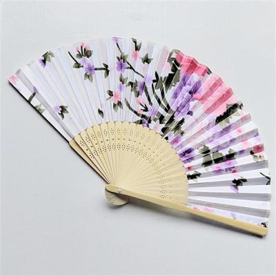 China Small Foldable Festival Manual Colorful Fabric Bamboo Hand Fan With Assorted Flower Pattern for sale