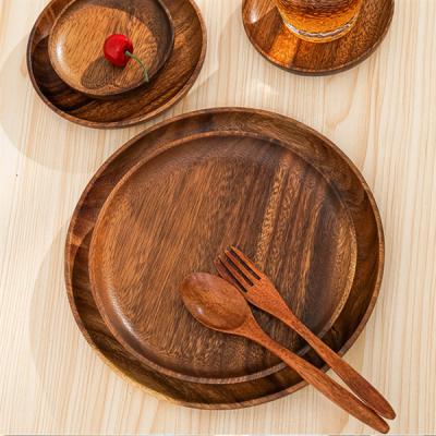 中国 装飾的なWooden Serving Plates Dinner Solid Round Acacia Wood Tray 18cm 20cm 販売のため