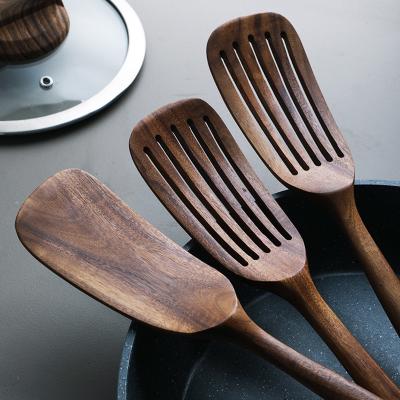 中国 33.8cm Teak Solid Kitchen Wooden Utensils熱抵抗力があるNon Stick Pan Spatula 販売のため