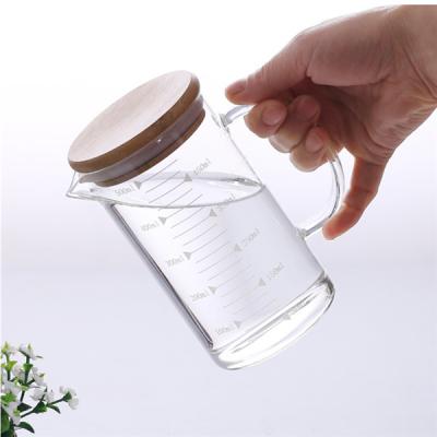 中国 電子レンジのホウケイ酸塩Glass Tea Cups 350ml 500ml 1000ml With Bamboo Lid 販売のため