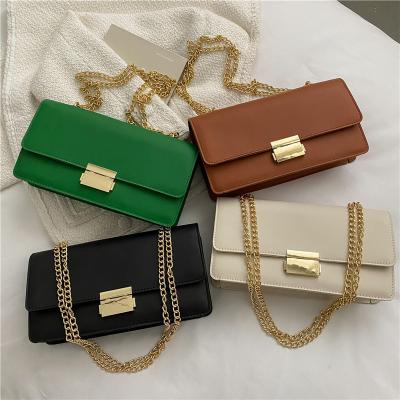 China High quality women fashion solid color handbag simple shoulder messenger bag texture lock small square bag wholesale for sale