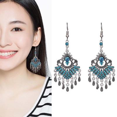 China Peacock Earrings Tassel Wind Style Chinese Earrings Retro Environmentally Friendly Helix Shaped Multilayer Diamond Earrings for sale