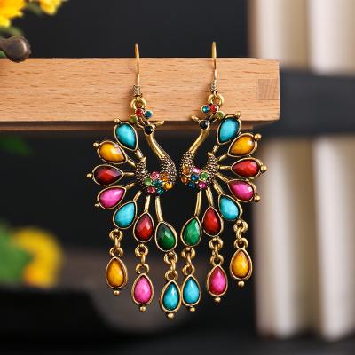 China Peacock Environmentally Friendly Creative Retro Ethnic Style Diamond Alloy Hollow Stud Earrings Wholesale for sale