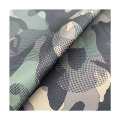 China 100%Polyester Softshell Fabric Waterproof Camouflage Softshell Dewspo Bonded Fabric For Garment for sale