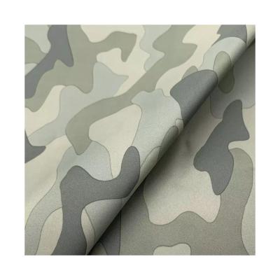 China Good condition waterproof 100%polyester Dewspo bonded softshell fabric camouflage for garmentSoftshell fabric for sale