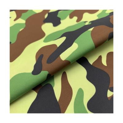 China Waterproof Polyester Softshell Fabric 100%Polyester Dewspo Camouflage Bonded Fabric Softshell Fabric for sale