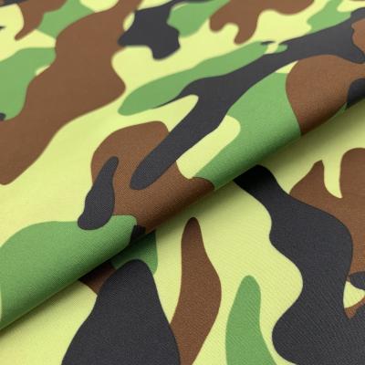 China Good Condition Waterproof Softshell Fabric 100%Polyester Camouflage Softshell Dewspo High Quality Polyester Metallic Fabric for sale