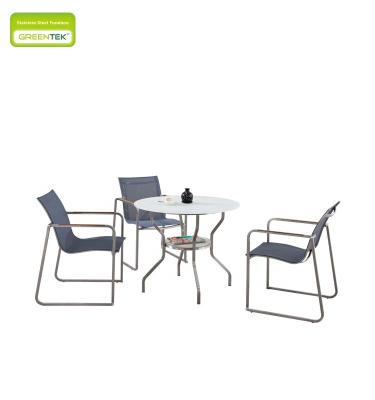 China Modern Super White Tempered Glass Round Table With Teslin Chair Teak Armrest Comfortable Fashion Style Cafe Set Outdoor Furniture for sale