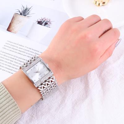 China Day/Date Hot Selling Women Watches Adjust Stainless Steel Gold Female Watch Diamond Wristwatch Quartz Wrist Watch for sale