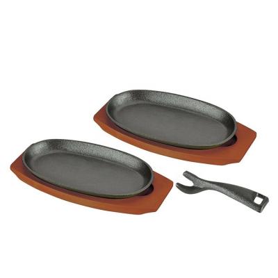 China Durable Wholesale Steak Dish Cooking Cast Iron Sizzling Dish With Barbecue Wooden Base Griddle Oval Steak Sizzling Dish for sale