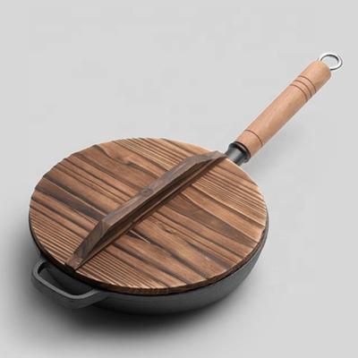 China Hot Selling Uncoated Sustainable Iron Pan Round Cast Iron Cooking Non-Stick Frying Pan With Wooden Handle for sale