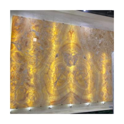 China Modern Luxury Premium Polished Natural Yellow Onyx Rosin Wall Marble for sale