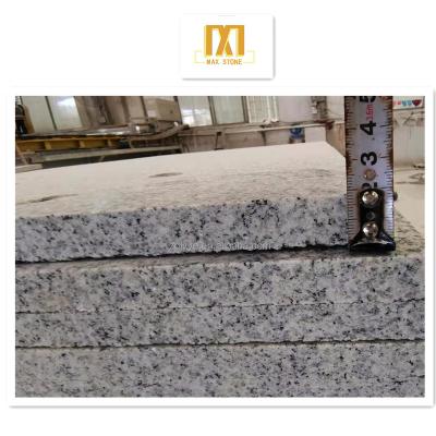 China Modern G654 Flamed Tile Sesame White Granite Impala Granite For Home Renovation for sale