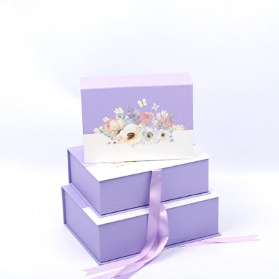 China Biodegradable Custom Purple Eco Cardboard Crate Rigid Box With Magnetic Ribbon Clothing Packaging Boxes for sale