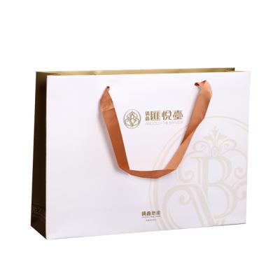 China Biodegradable Paper Bags Print Customized Promotion Custom Logo Kraft Paper Item Time Industrial Surface Gift Apparel for sale