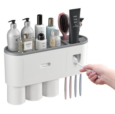 China Sustainable Bathroom Accessories Sets Automatic Toothbrush Holder Toothpaste Squeezer Wall Mount Storage Rack Bathroom Product Top for sale