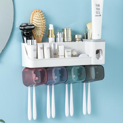 China Stocked Bathroom Toothbrush Holder With Cups Automatic Toothpaste Squeezer For Bathroom Wall Mounted Organizer for sale