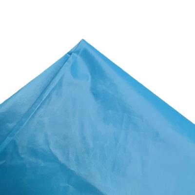 China Waterproof Blue Nylon Taffeta Fabric Oil Wax 100% Nylon Fabric For Sunscreen Clothing for sale