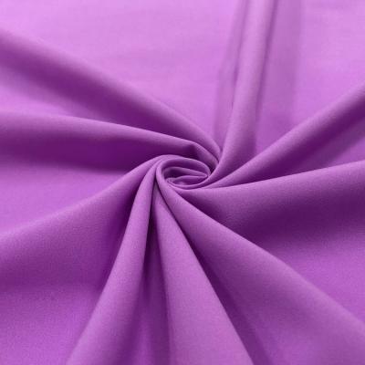 China Purple Stock Waterproof Fabric Upholstery Textiles Fabric For Active Wear Wear 4 Way Stretch Woven Textile for sale