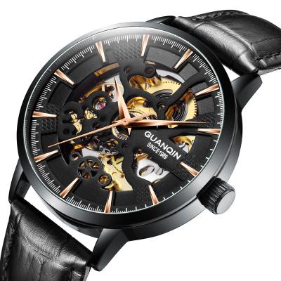 China GUANQIN Water Resistant Watch Brands Fashion Hollow Out Design Stainless Steel Men's Skeleton Style Promotional Mechanical Watches for sale