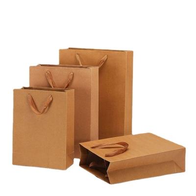 China Recyclable Wholesale Custom Printing Reusable White Or Brown Kraft Paper Shopping Bag With Twisted Handle for sale