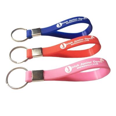 China fashion & cheap popular fashion silicone wristband keychain with 2D Logo Embossed custom silicone key chain for sale