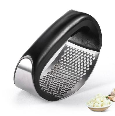 China Viable Kitchen Accessories Garlic Press Grater Stainless Steel Meat Grinder and Grinder with Silicone Peeler Roller Easy to Clean for sale