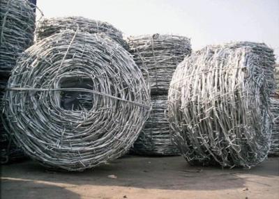 China Low Carbon Steel 7.5cm SWG18 Coiled Barbed Wires for sale