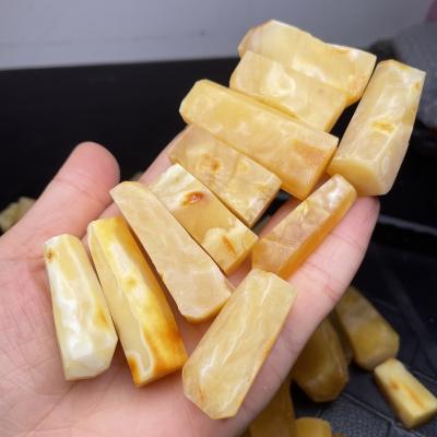 China A Baltic Imam AMBER with tiger-skin inscriptions of high-end Russian white amber and natural amber strips 10-18 mm in diameter for sale