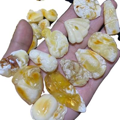 China High Quality Skin Grain Mateiral Natural Ore Tiger Imam Carving Baltic Amber Pendant Less Than 5G Muslim Amber for sale