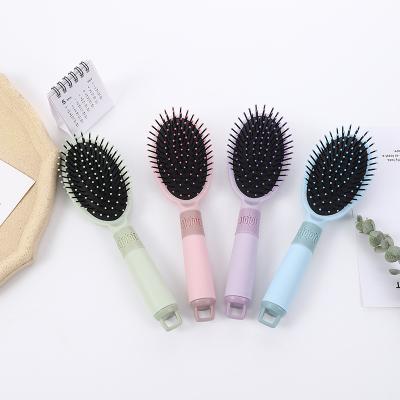 China Home color massage airbag comb straight hair wholesale anti-static stain new plastic hair comb for sale