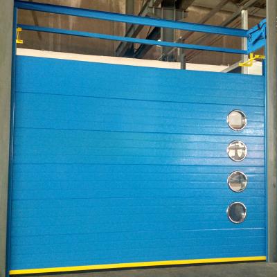 China Modern Steel And PU Foam Board Automatic Industrial Stacking Door en venta