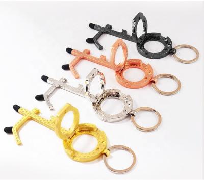 China Promotion gift new no touch metal bottle opener, touch phone holder, door opener self-defense key chain for sale