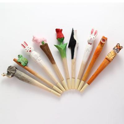 China Normal Customized Cute Cartoon Wood Carving Hand-carved Wooden Gel Pen for sale