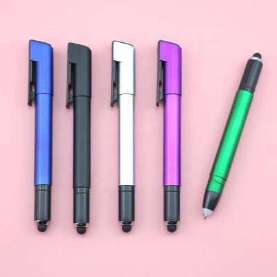 China Promotional Multifunctional Pen 4 in 1 Phone Holder Stylus Light Up Pen with Company Logo for sale